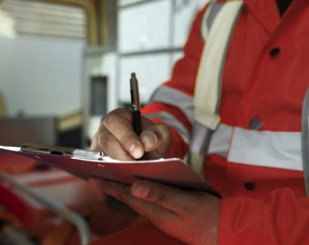 side-view-man-taking-notes-ambulance-car